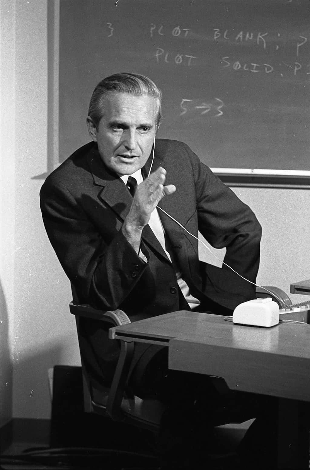 A grainy black-and-white photo of electical engineer Douglas Engelbart practising for his big demo.