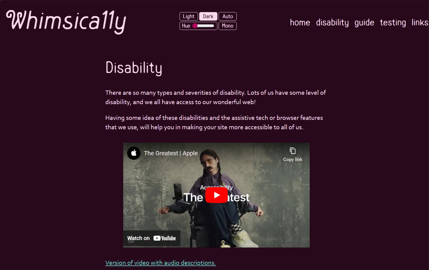 A screenshot of the Whimsica11y website in dark mode - a video is embedded: The Greatest, by Apple.